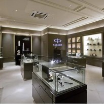 Mẫu tủ vàng bằng gỗ công nghiệp kết hợp kính cường lực