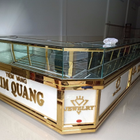 Mẫu tủ vàng inox chữ L bo góc tròn 