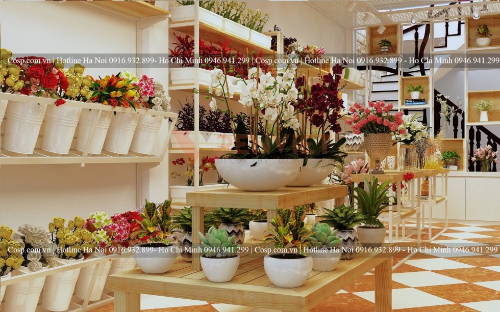 Vách ngăn cầu thang cũng được trang trí bởi những mẫu chậu hoa nhỏ xinh